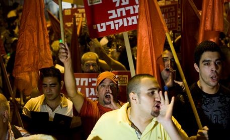 Hadash activists during a rally against the "Citizenship Law" in Tel Aviv, on 16 October 2010