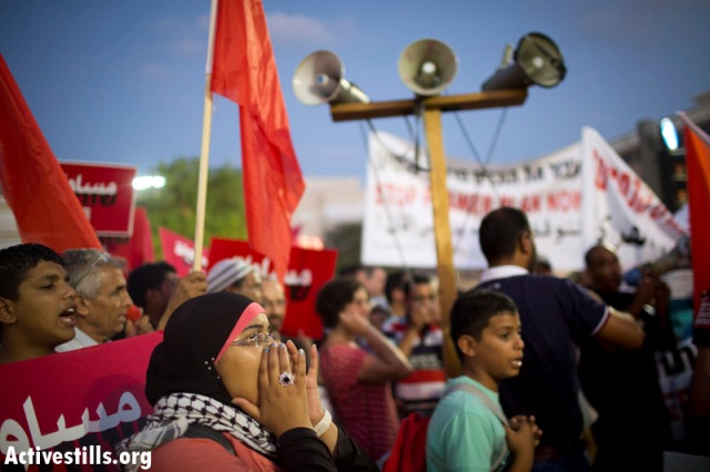 Demonstrator at the Anti-Prawer rally in Tel Aviv, September 2013 (Photo: Activestills)