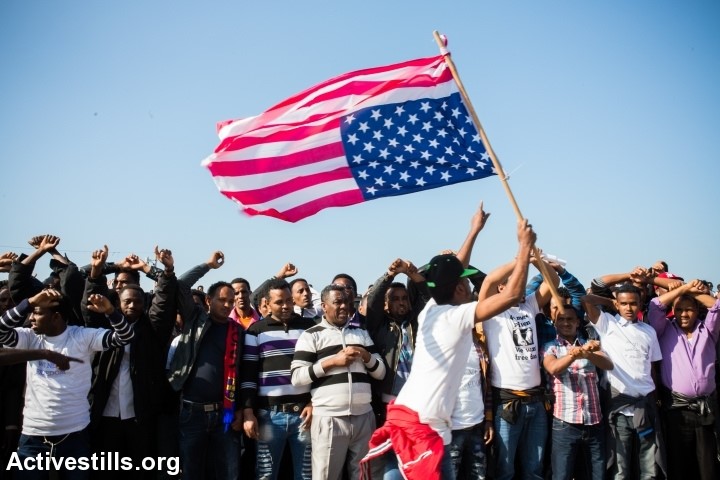 Around 20,000 African refugees and supporters participate in the main demonstration in front of the American embassy, calling to support their struggle against Israel's asylum policies, Tel Aviv, January 6, 2014 (Photo: Activestills)