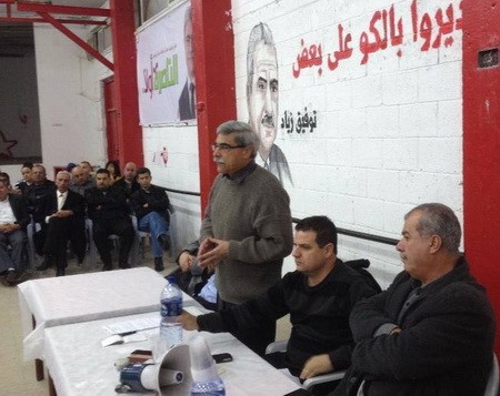 Ramez Jeraisy during a Hadash meeting in Nazareth with Hadash Chairman, MK Mohammad Barakeh and Hadash Secretary, Ayman Odeh (Photo: Al Ittihad)