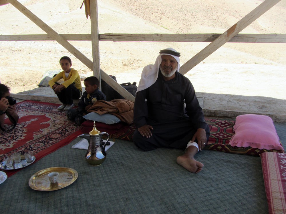 Khalil Hamdan, a resident of Wadi al-Qatif, and two community children (Photo: B'Tselem)