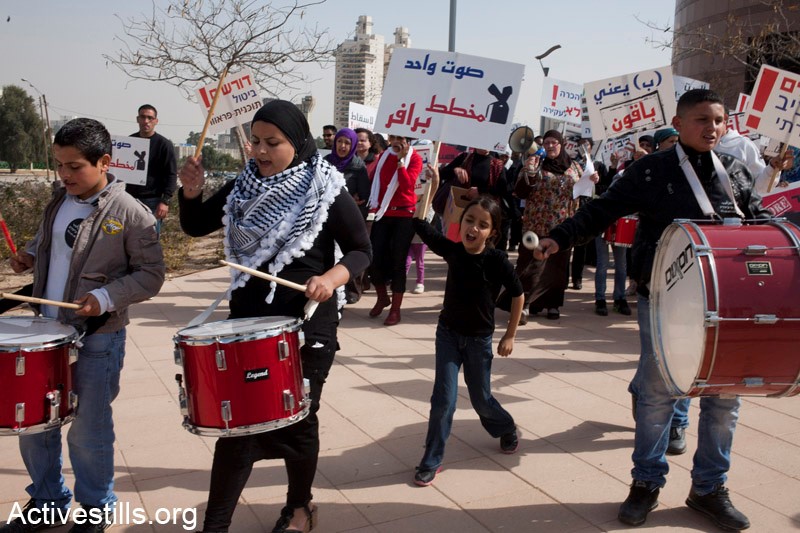 Arab-Bedouins protesting against the Prawer Plan in Beer Sheva, on the March 21, 2012. The Prawer Plan, approved by the Israeli government on the 11th of September, 2011, envisions the resettlement of more than 30,000 Bedouin citizens through the destruction of most unrecognized Bedouin villages in the Negev desert. The plan, which incidentally does not apply to Jewish communities in the same area, is seen by some as the "final solution" for decades of forced displacement and harassment of the Negev Bedouins (Photo: Activestills)