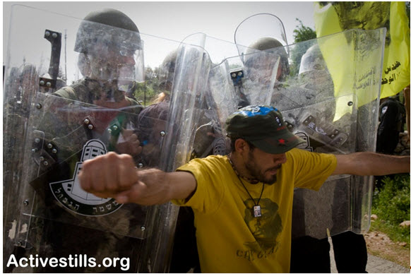 Protest at Bil'in against Israel’s separation barrier, April 2011.
