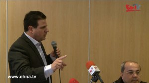 Ayman Odeh (Hadash), the number one candidate of the Hadash-Arab parties list, speaks during Friday's news conference. To the right, MK Ahmad Tibi.