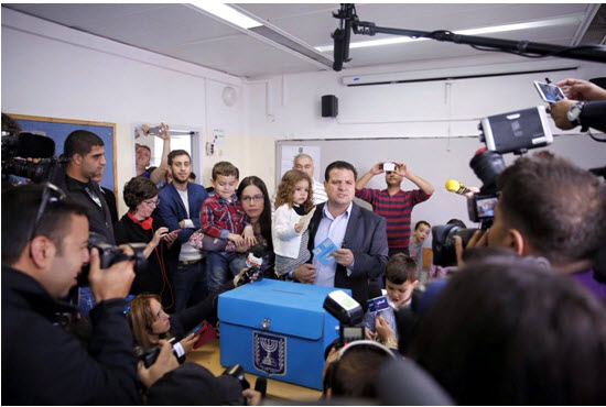 Joint List leader Ayman Odeh voted in Kababir near his Haifa home on Tuesday morning.