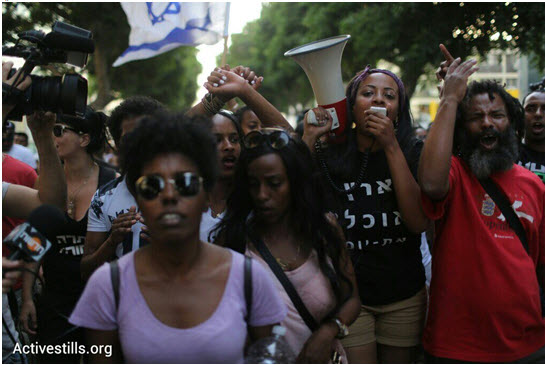 Ethiopian Israelis and their supporters demonstrate on Rothschild Boulevard in Tel Aviv on Monday May 18.