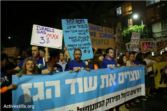 Thousands gathered in Tel Aviv Saturday evening, July 4, to protests against the terms of a proposed natural gas deal.