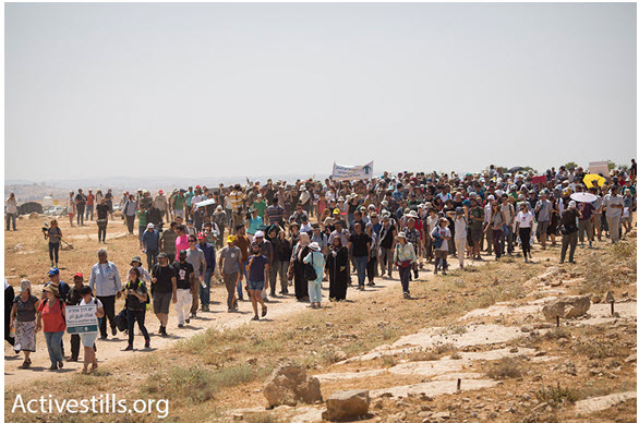 Hundreds of Palestinian, Israeli and international activists march to demand that Israel not demolish Suyisa, South Hebron Hills, July 24, 2015.