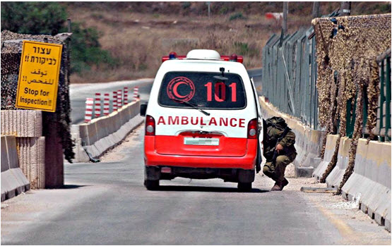 A Palestinian ambulance at an occupation army checkpoint