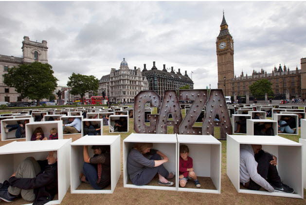 At Parliament Square in London on August 14, 2014, 150 men, women and children crammed themselves into boxes to illustrate the conditions faced by the people in Gaza who are trapped by the blockade. The event was organized by Oxfam.