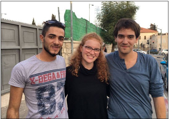 Occupation objector, Tamar Alon, who has refused military conscription is flanked by Arab Aramin, left, and Yigal Elchanan, right, each of whom is the bereaved brother of a young girl, one Palestinian the other Israeli, during in the continuing cycles of violence. For Tamar, the testimonies of both Arab and Yigal during the tenth Israeli-Palestinian memorial ceremony this past spring constituted “the defining moment in which I realized that I must refuse.”