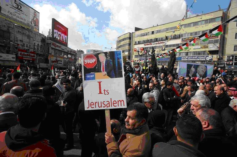 Demonstrators in Ramallah’s Menara Square protesting on Thursday, January 19, against the incoming President Trump and his plans for the US embassy in Israel.