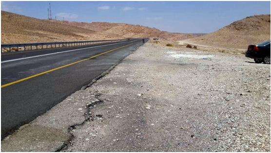The new guardrail installed along Highway 31 which blocks access to it from the Bedouin village of Umm Bidoun