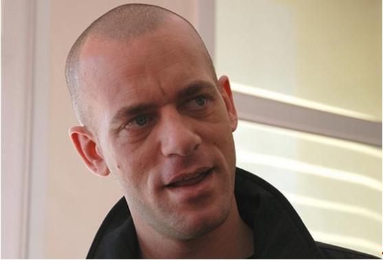 Addameer's field researcher Salah Hamouri detained by Israeli forces during a raid on August 23, 2017