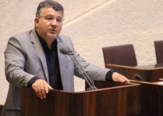Hadash MK Yousef Jabareen from the Joint List addresses the Knesset plenum. 