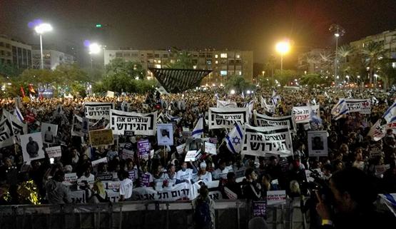 Tens of thousands of demonstrators gathered in Tel Aviv’s Rabin Square on Saturday night, March 24, to protest the government’s racist plan to deport African refugees and asylum seekers.