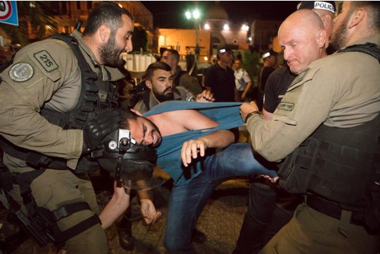 Police using brutal force against demonstrators in Jaffa Street in Haifa, Friday night, May 18