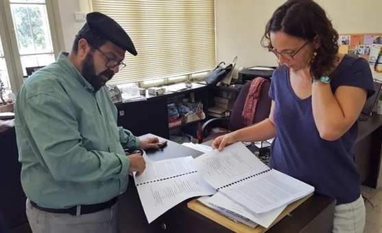 Adalah lawyers Hassan Jabareen and Suhad Bishara review their organization’s petition before it is submitted to the Supreme Court.