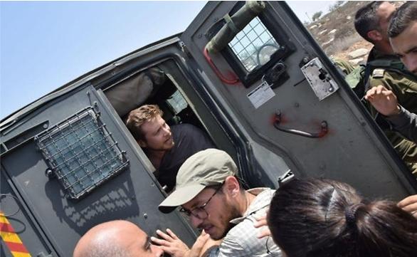 Border police detain Avner Gvaryahu, director of Breaking the Silence, on a tour of the South Hebron Hills, August 31, 2018.