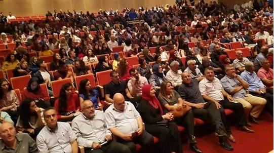 The audience attending the performance of the musical group Siraj in Umm al-Fahm, last Saturday night, September 15; among the participants (seated in the front row): Hadash MK Youssef Jabareen (fourth from right) and Hadash Chairman, Dr. Afo Agbaria (fourth from left), a former Hadash MK, and several Communist Party activists in the city.