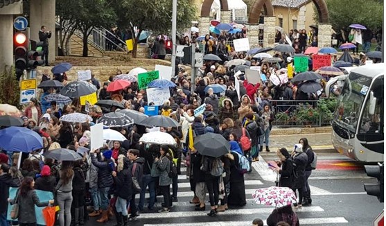 Hundreds of social workers as they demonstrate and block Pal-Yam Street in Haifa, last Thursday, December 6. 