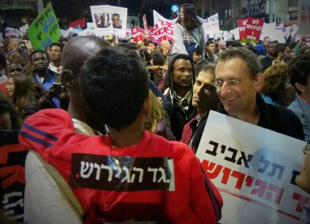 MK Dov Khenin during a demonstration in South Tel Aviv held against the expulsion of African asylum seekers and refuges, April 2018