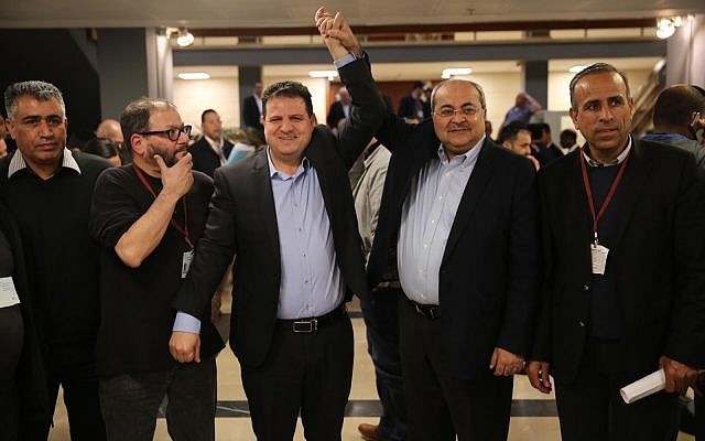 From left to right, Hadash candidates Yousef Atawne, Dr. Ofer Cassif, MKs Ayman Odeh and Ahmad Tibi, and Hadash secretary Mansour Dahamshe after having submitted to the Knesset's Central Elections Committee a united list of candidates from Hadash and Ta'al running together in April's upcoming elections, February 21, 2019