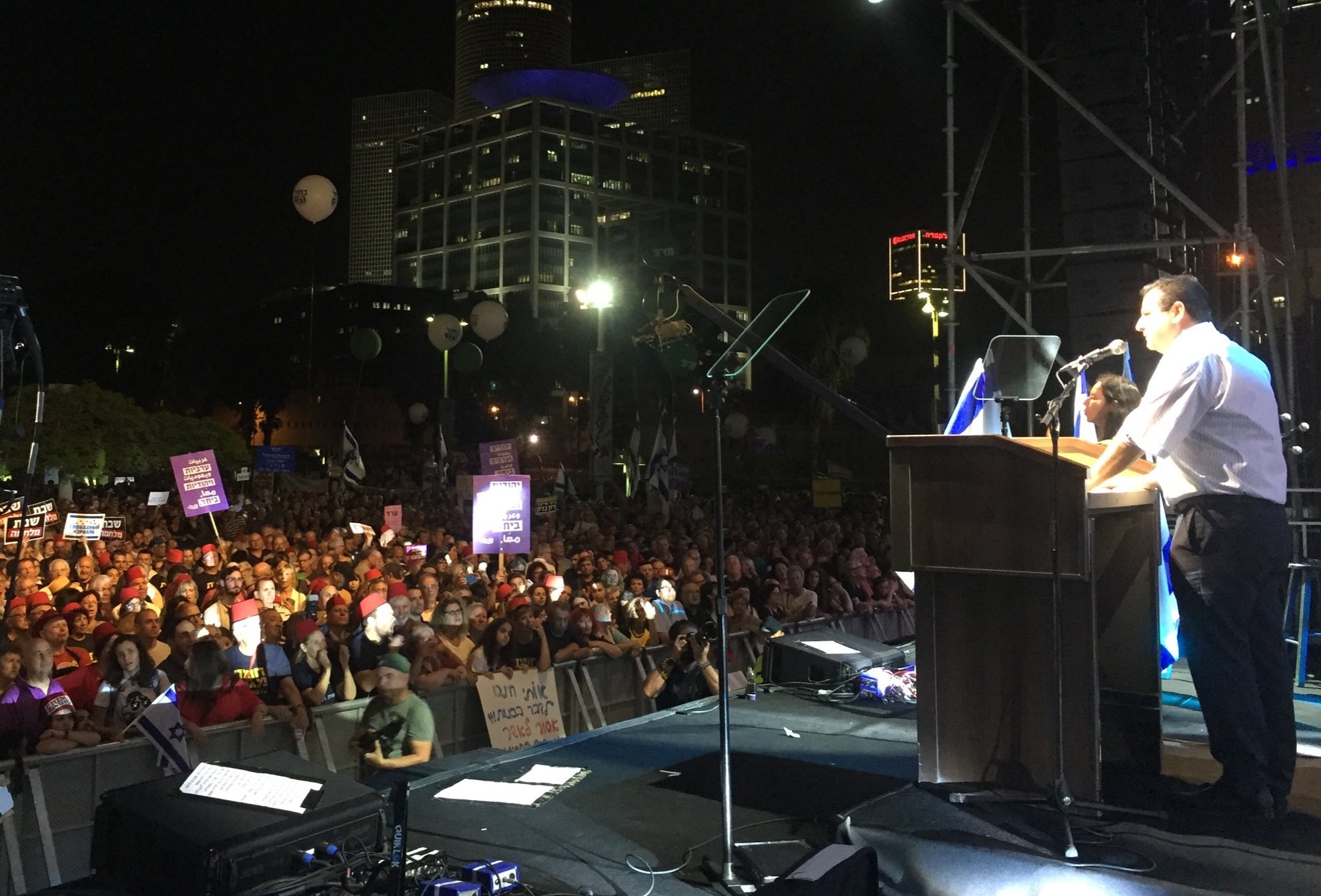 MK Ayman Odeh addresses the mass of demonstrators on Saturday night, May 25, in Tel Aviv.