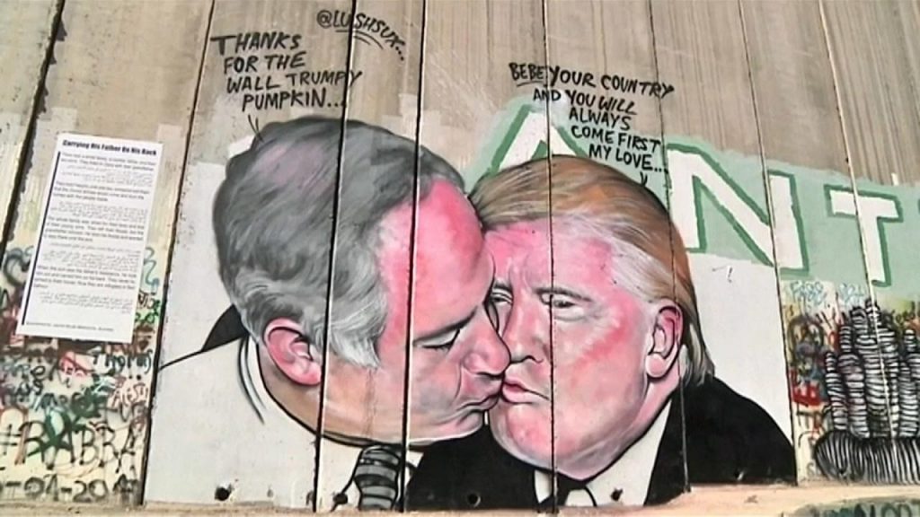 Australian graffiti artist @LushSux painted this giant mural on the Israeli security barrier where it runs through the West Bank city of Bethlehem.