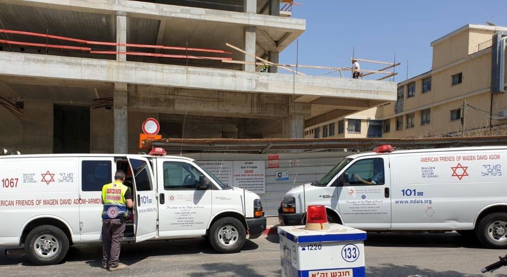 Medical teams at a construction site in Petah Tikva were two workers were seriously injured, May 2019