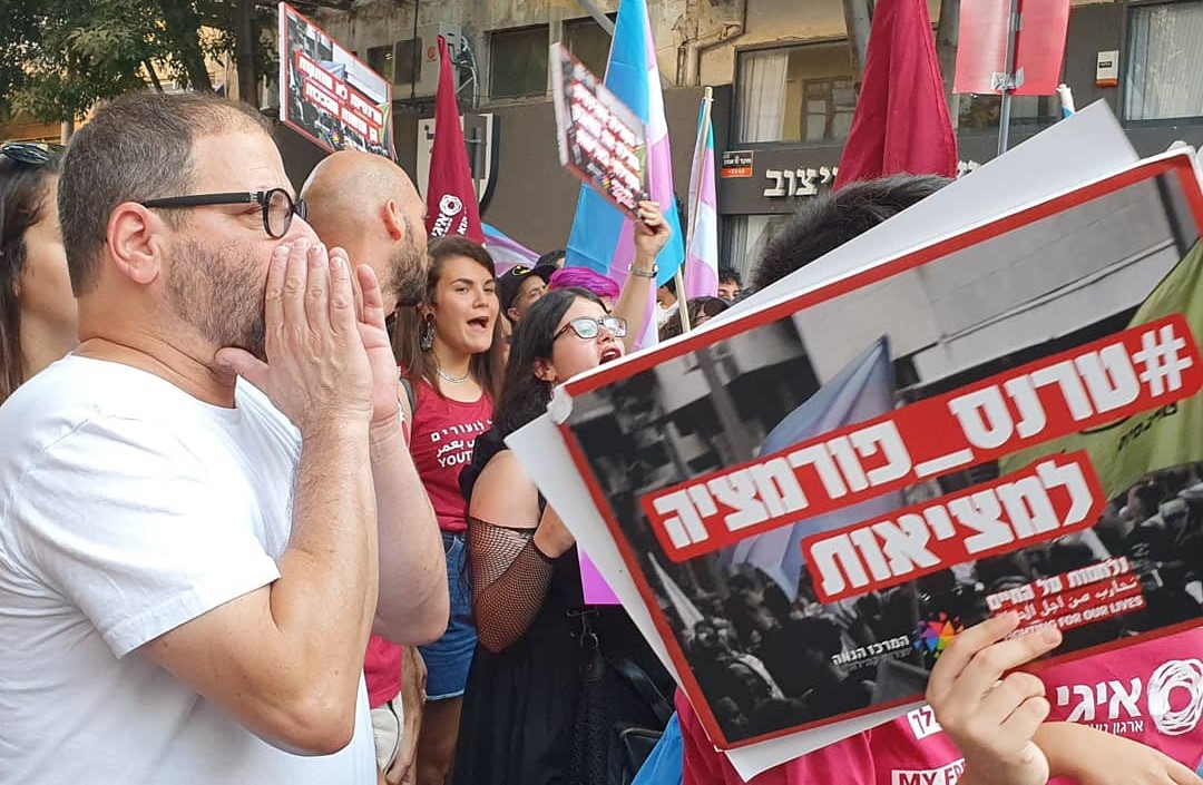 MK Ofer Cassif (first from left) during the "Fighting for Our Lives" march held in Tel Aviv last Sunday, July 28