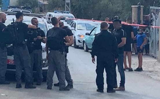 Police officers outside the home of Amina Yassin-Farhat in Jadeidi-Makr on Saturday, August 17, 2019
