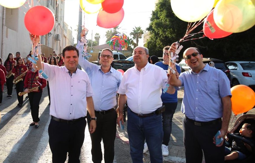 MK Ayman Odeh (first from left) with Joint List candidates Mtanes Shehadeh, MK Ahmad Tibi and Sammy Abu Shehadeh during a campaign tour in Jaffa during the recent Eid al-Adha festival 