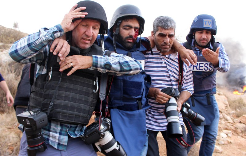 Palestinian photojournalist Moath Amarneh was seriously injured while covering protests in Surif, near the West Bank city of Hebron, November 15, 2019.