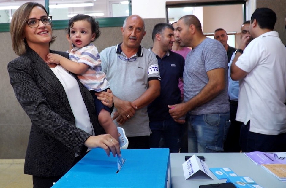 MK Heba Yazbak voting in last September's election