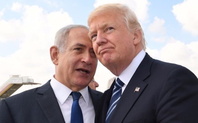 Prime Minister Benjamin Netanyahu and US President Donald Trump confer at Ben Gurion International Airport prior to the latter's departure from Israel on May 23, 2017.