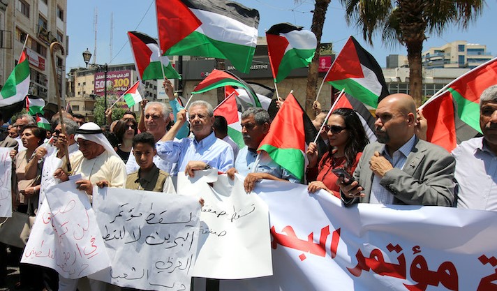 Palestinians in Ramallah protest the Trump administration's "Deal of the Century," June 15, 2019. (Photo: Activestills)