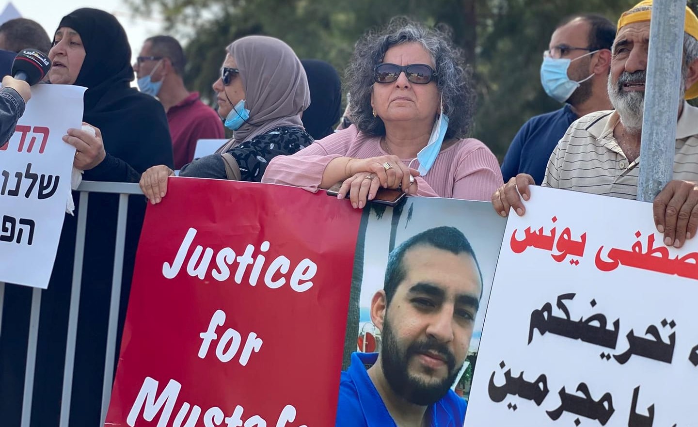 Abir Younis, the mother of Mustafa (at extreme left with microphone), and MK Aida Touma-Sliman (third from left) during the protest held Monday, May 19, at Sheba Hospital