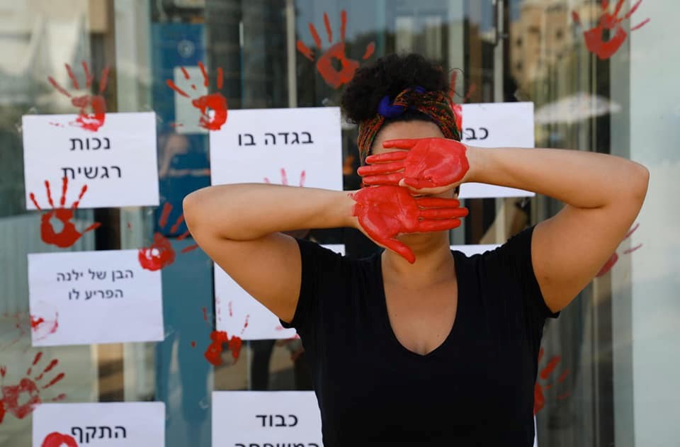 One of the protestors against rising tide of femicide in Israel, last Monday, May 18, at Habima Square in Central Tel Aviv