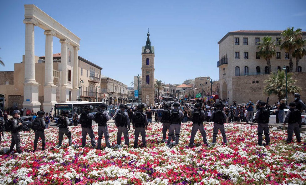 Police are deployed against demonstrators protesting the decision to demolish the ancient cemetery in Jaffa, June 12, 2020