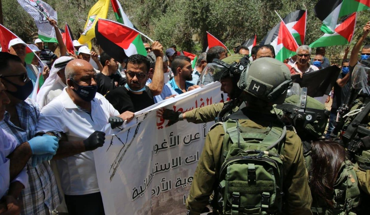 On June 13, Palestinians protested at the entrance to the village of Az-Zubeidat in the Jordan Valley against the US-Israeli annexation plan that is expected to take effect on July 1.*