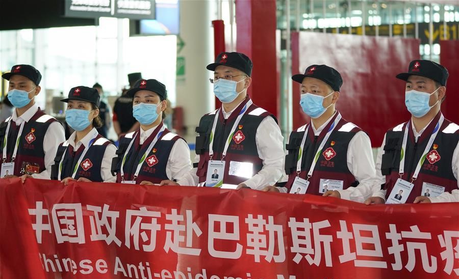 Members of a Chinese anti-epidemic expert medical team to Palestine attend a departure ceremony at Jiangbei International Airport in Chongqing, southwest China, Wednesday, June 10, 2020, just prior to its departure for Palestine. The team, organized by China's National Health Commission, left Chongqing for Palestine, where it helped Palestinians in the West Bank in their fight against COVID-19, and returned to China on June 18, after having successfully completing its mission.