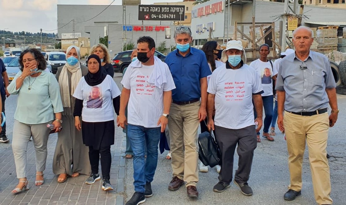 On the second day of its six-day campaign, the Mothers for Life Movement marched on Wednesday, August 12, in the city of Baqa al-Gharbiya. Among the marchers: Hadash MKs Aida Touma-Sliman (first from left), Ayman Odeh (middle, with black mask) and Jaber Asaqla (third from right in blue shirt).