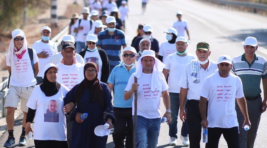 The Mothers for Life Movement march, Saturday, August 15, near Neve Shalom – Wahat al-Salam. Among the marchers were MK Ayman Odeh (center with walking stick) and other Hadash activists.