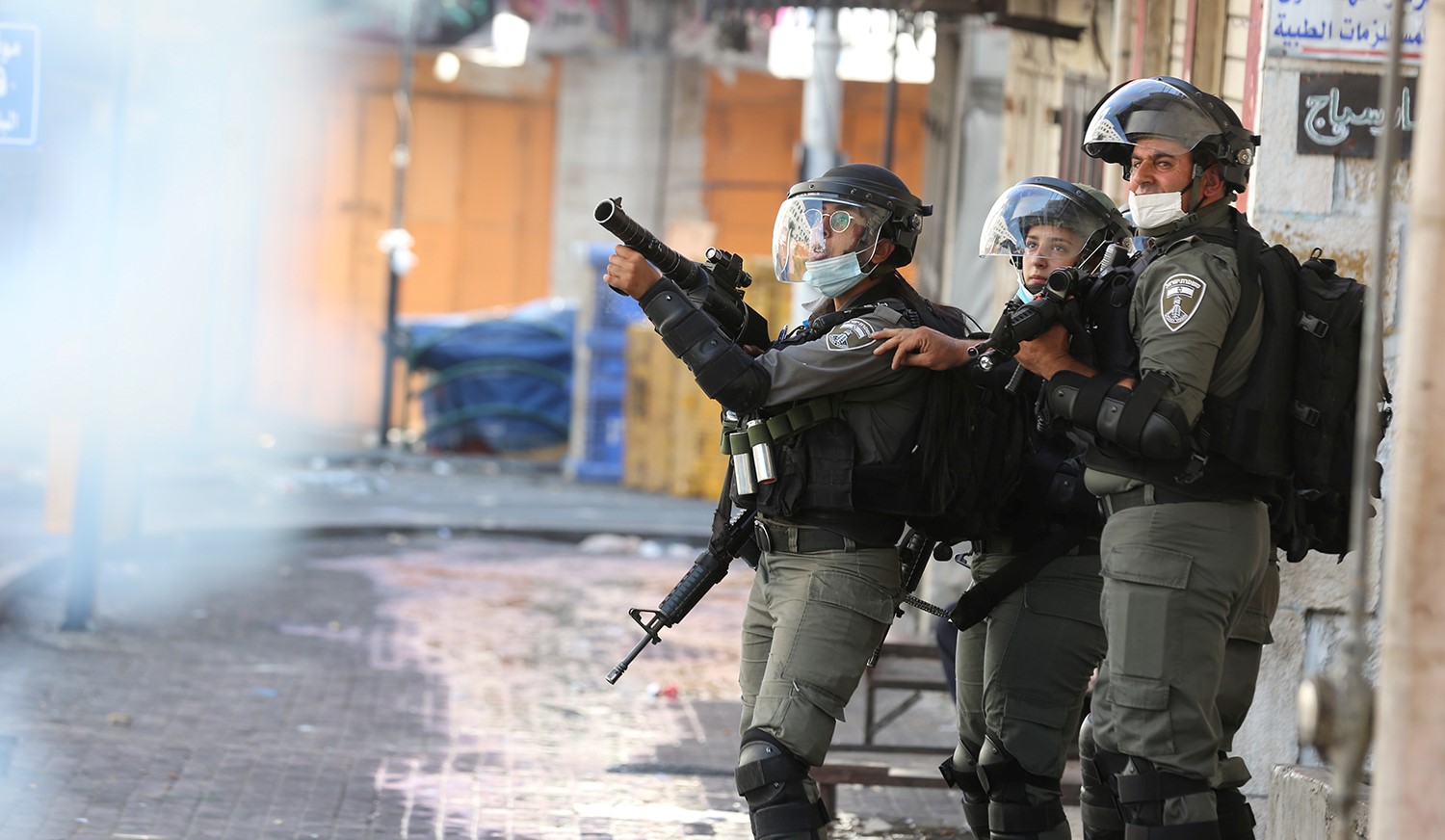 Israeli Border Police fire tear gas in Hebron on August 28, 2020.