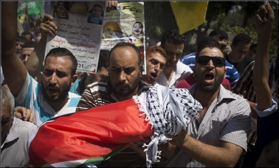 The funeral of 18-months-old child Ali Dawabsheh, the first of the three victims of his family to die as a result of the firebombing of their home by a Jewish terrorist, July 30, 2015.