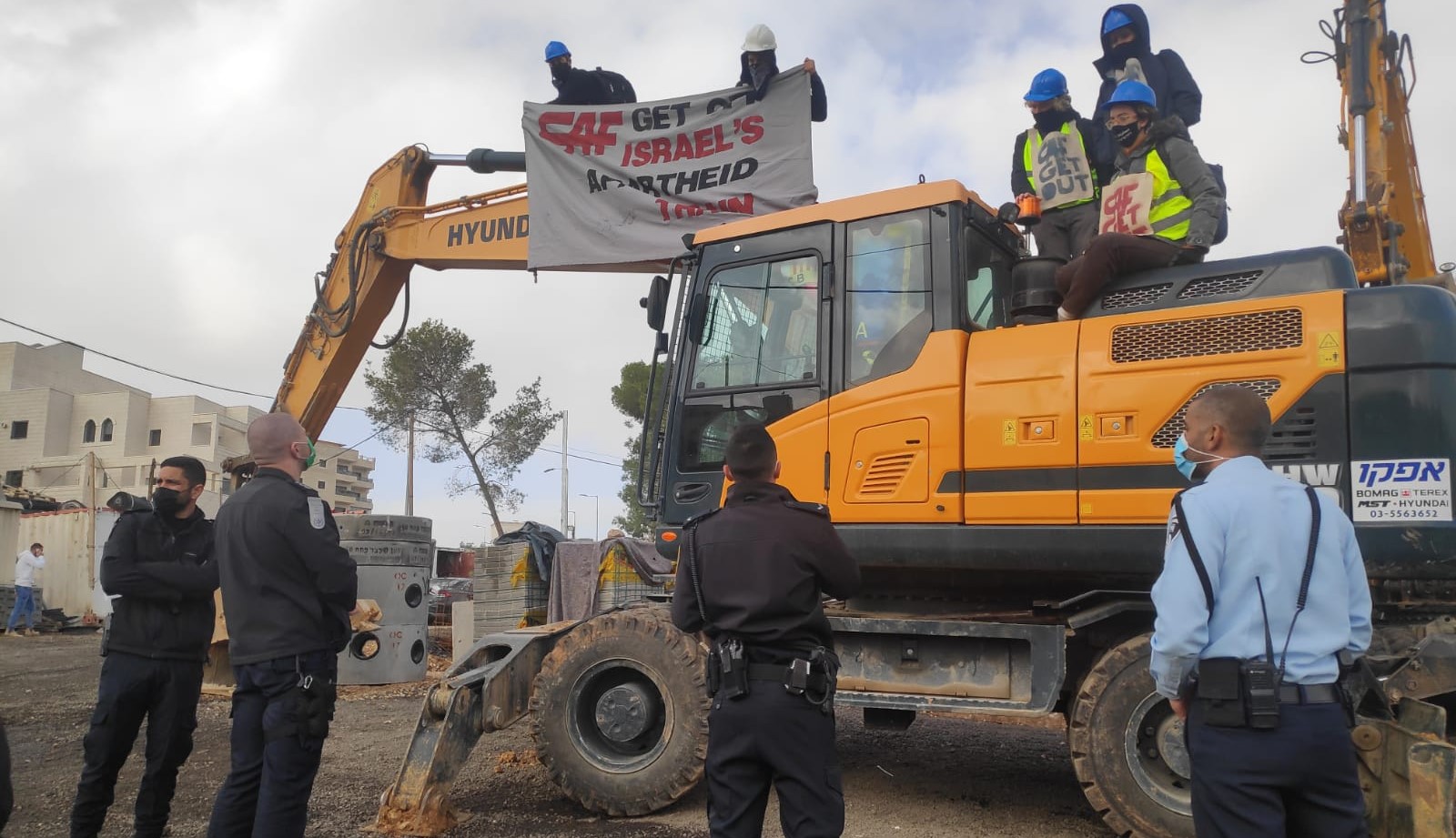 Israeli peace activists blocked construction of the Jerusalem Light Rail in Israel's Gilo settlement on December 15, 2020.