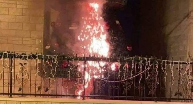 One of the two torched Christmas trees placed outside churches in Sakhnin, December 26, 2020