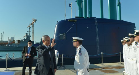 Prime Minister Benjamin Netanyahu welcomes a new submarine to the Israeli Navy fleet at a ceremony in Haifa in 2016.