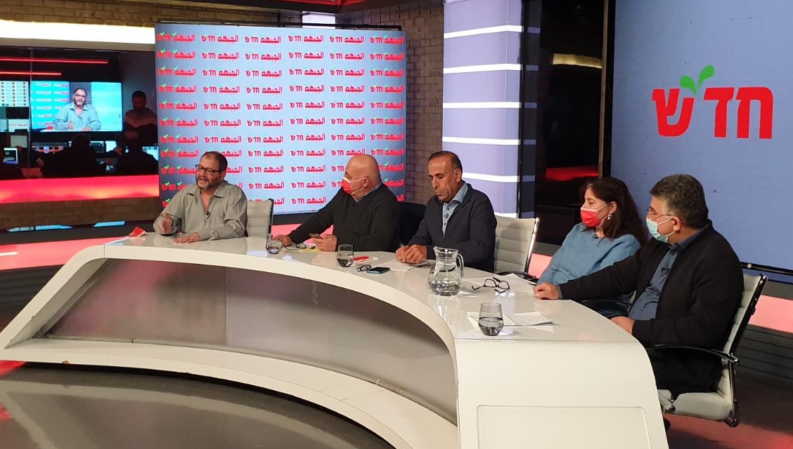 MKs Ofer Cassif (first from left) and Youssef Jabareen (first from right) during the electoral council of the Democratic Front for Peace and Equality (Hadash – Jabha) held last Saturday evening, January 16, 2020; in the center of the dais from left to right are the Chairperson of Hadash and former MK Dr. Afu Aghbaria, Secretary General of Hadash Mansour Dehamshe, and Member of the Hadash Secretariat Indiah Sagheir.